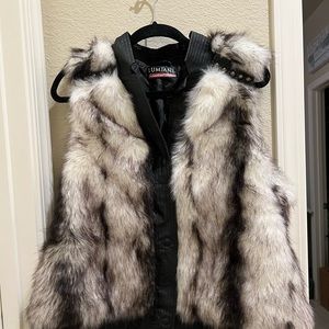 Faux Fur vest with faux leather trim